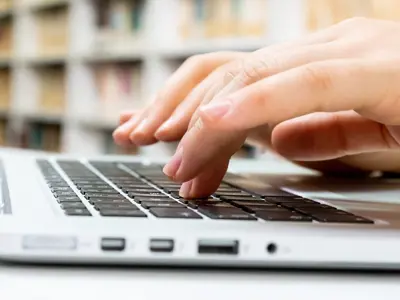Person working on a laptop