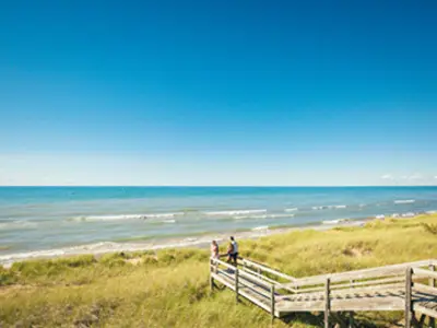 family looking out at the beach